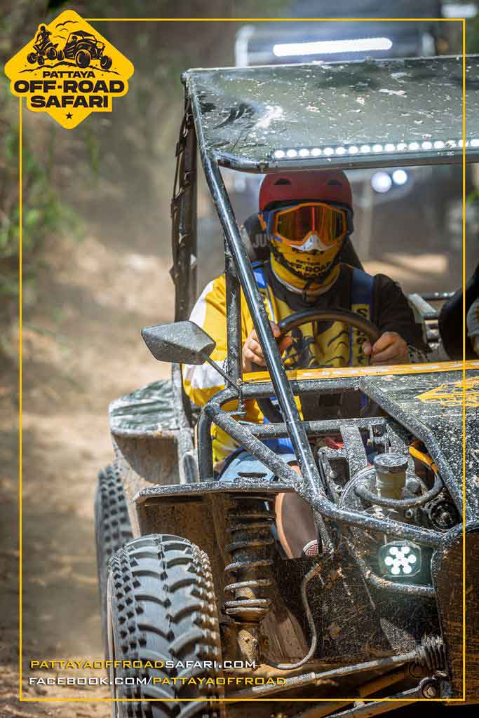 Mud-covered off-road buggy on a Pattaya jungle track